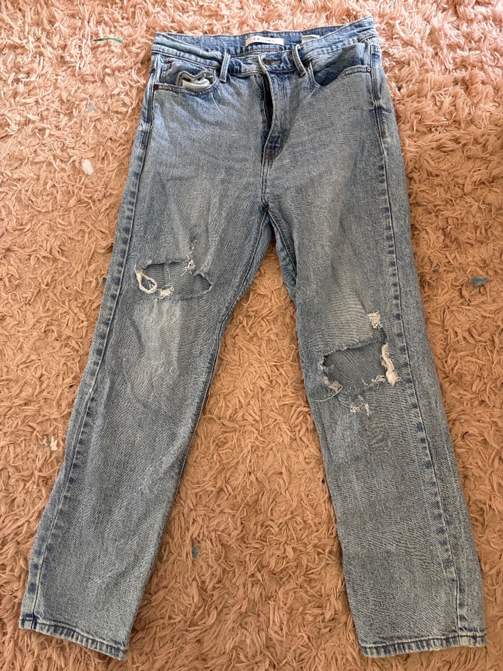 Light Wash distressed ripped jeans